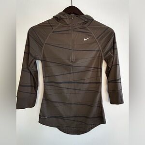 XS Nike dri fit running top in brown with black line details and 3/4 sleeves